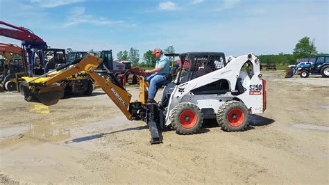 wood backhoe dual skid steer|skid steer mounted backhoe.